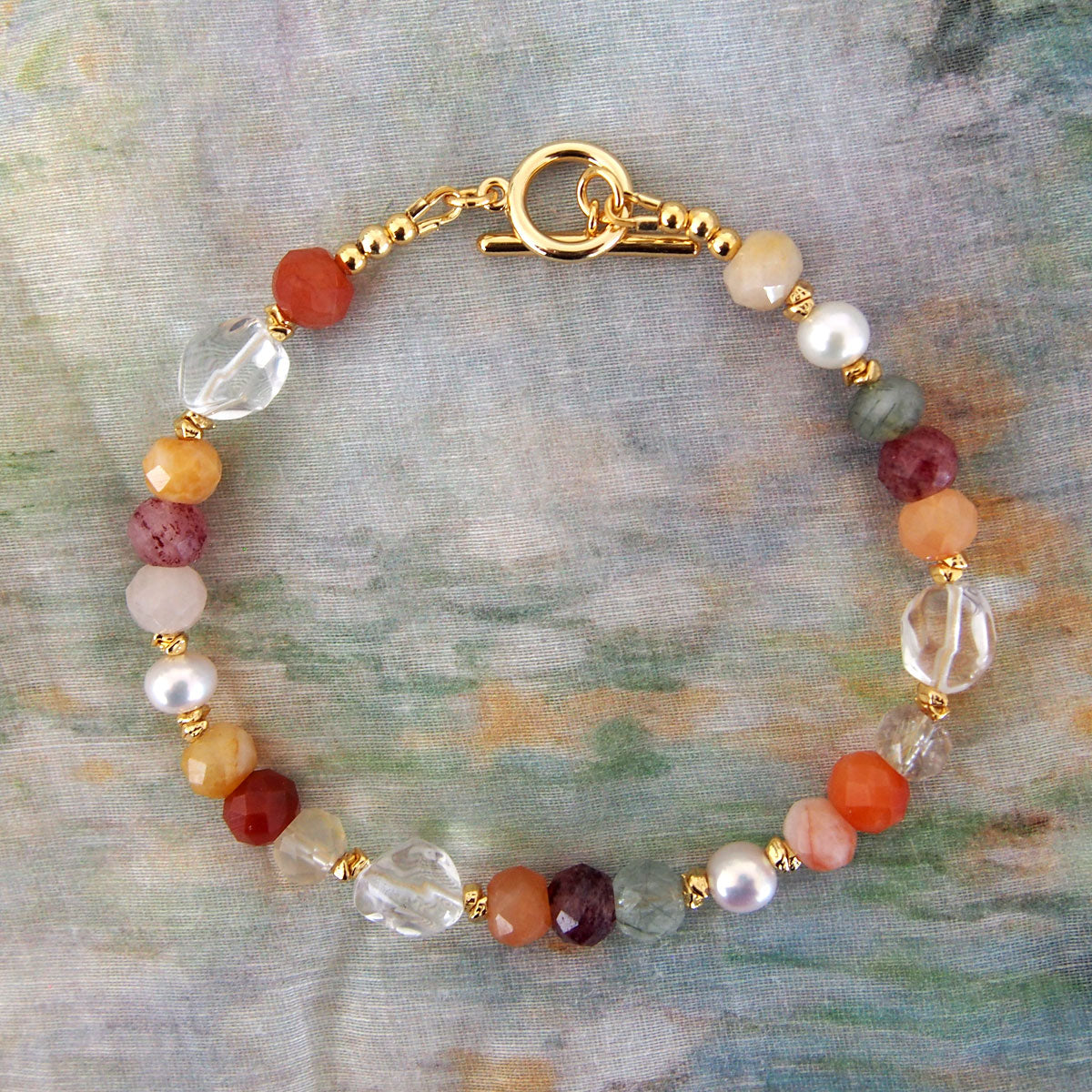 Agate, Pearls, Quartz Rutilated, Rock Crystal, Strawberry Quartz Bracelet- Vigour
