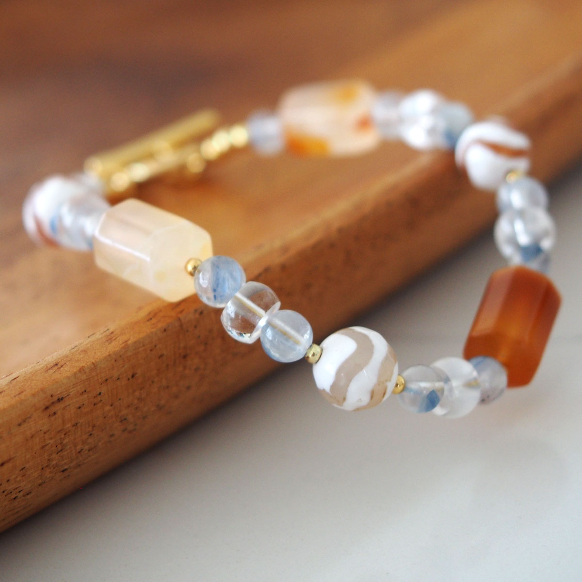 Agate, Rock Crystal, Dumortierite Quartz Bracelet- Source