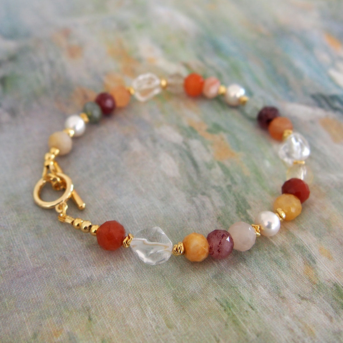 Agate, Pearls, Quartz Rutilated, Rock Crystal, Strawberry Quartz Bracelet- Vigour