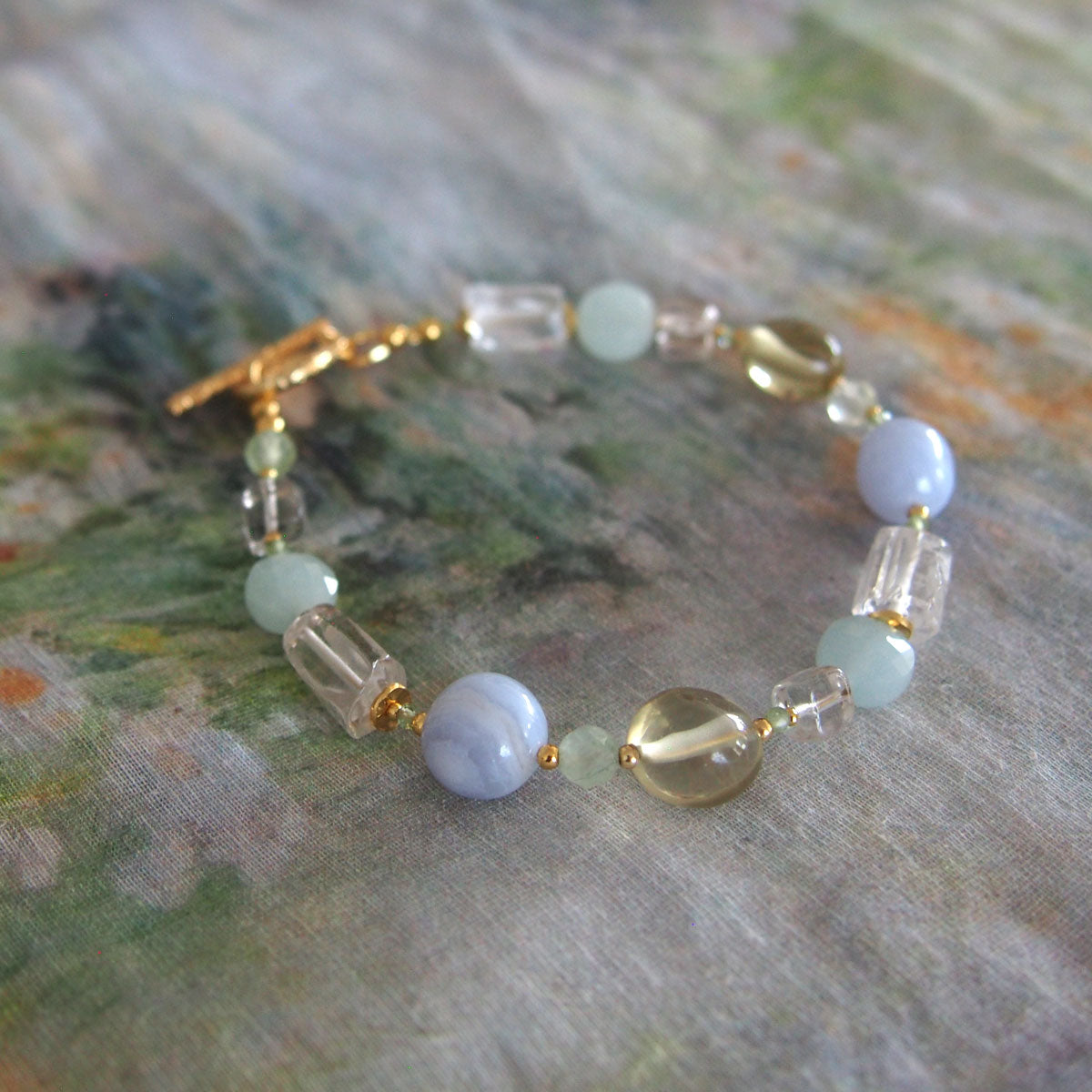 Chalcedony, Rock Crystal, Beryl, Prehnite Bracelet- Source