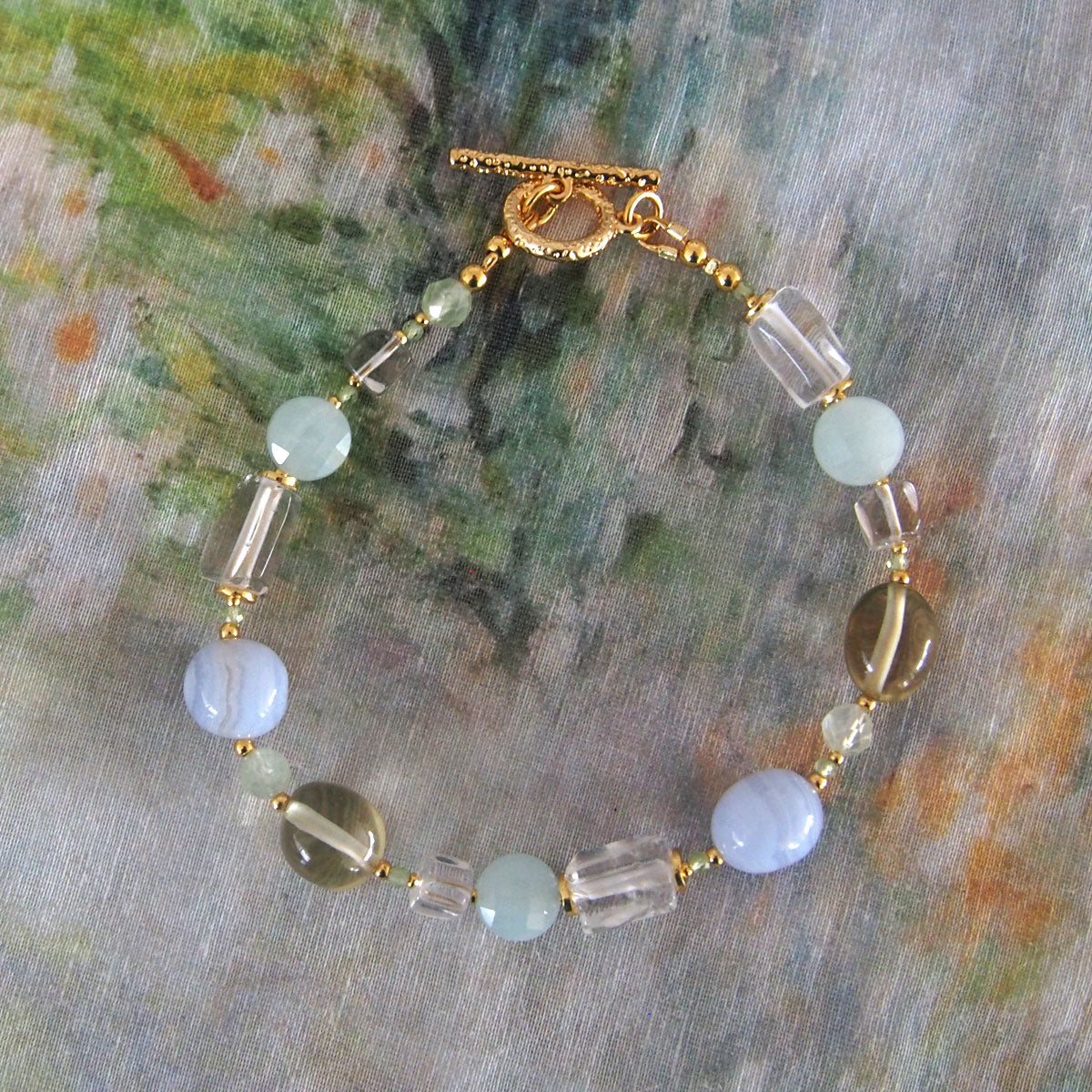 Chalcedony, Rock Crystal, Beryl, Prehnite Bracelet- Source